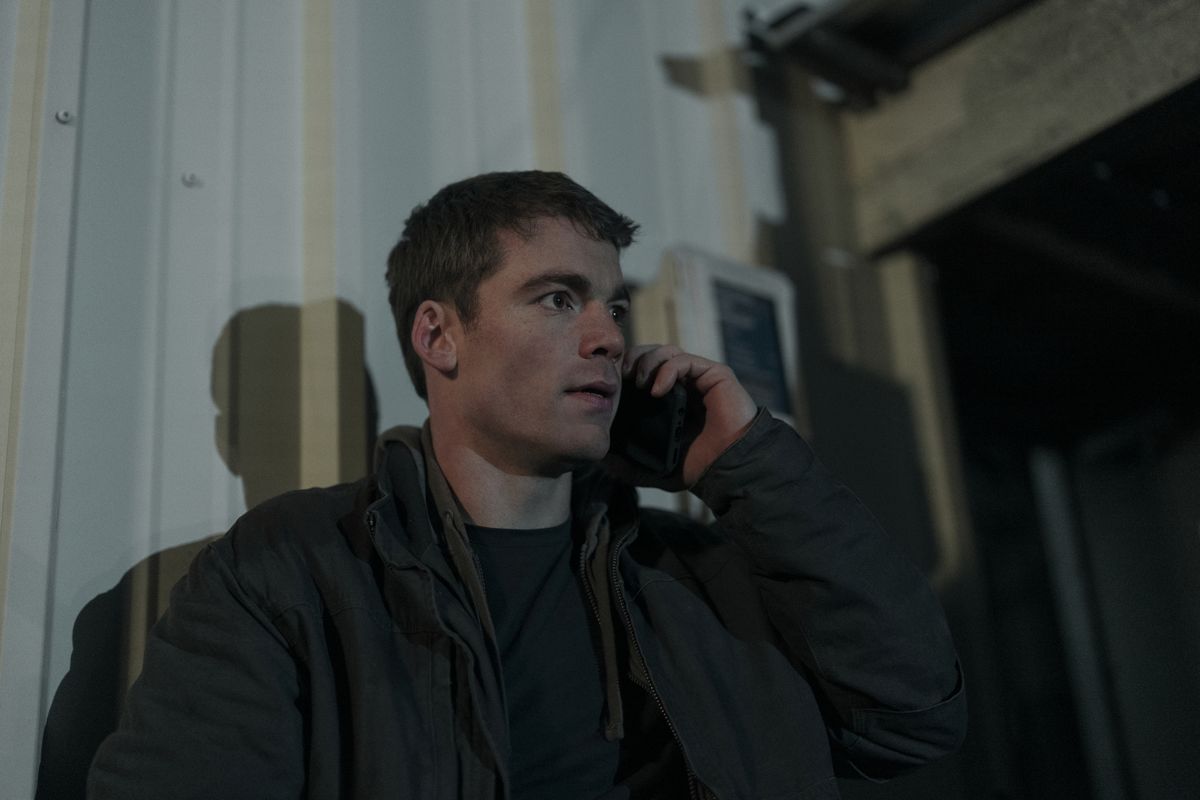 Peter is on the phone in The Night Agent season 2