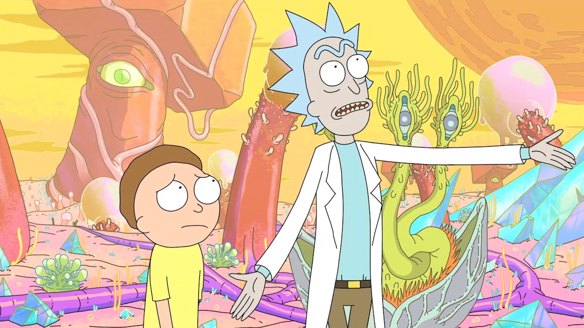 Rick and Morty standing next to each other from the hit show of the same name 