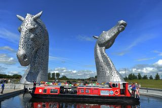 FALKIRK SCOTLAND JULY 05 Her Majesty Queen Elizabeth II and Prince Philip Duke of Edinburgh arrive on a canal boat at the Kelpies on July 5 2017 in Falkirk Scotland Queen Elizabeth II and Prince Philip Duke of Edinburgh visited the new section the Queen Elizabeth II Canal built as part of the 43m Helix project which features the internationallyacclaimed 30metrehigh Kelpies sculptures Photo by Mark RunnaclesGetty Images