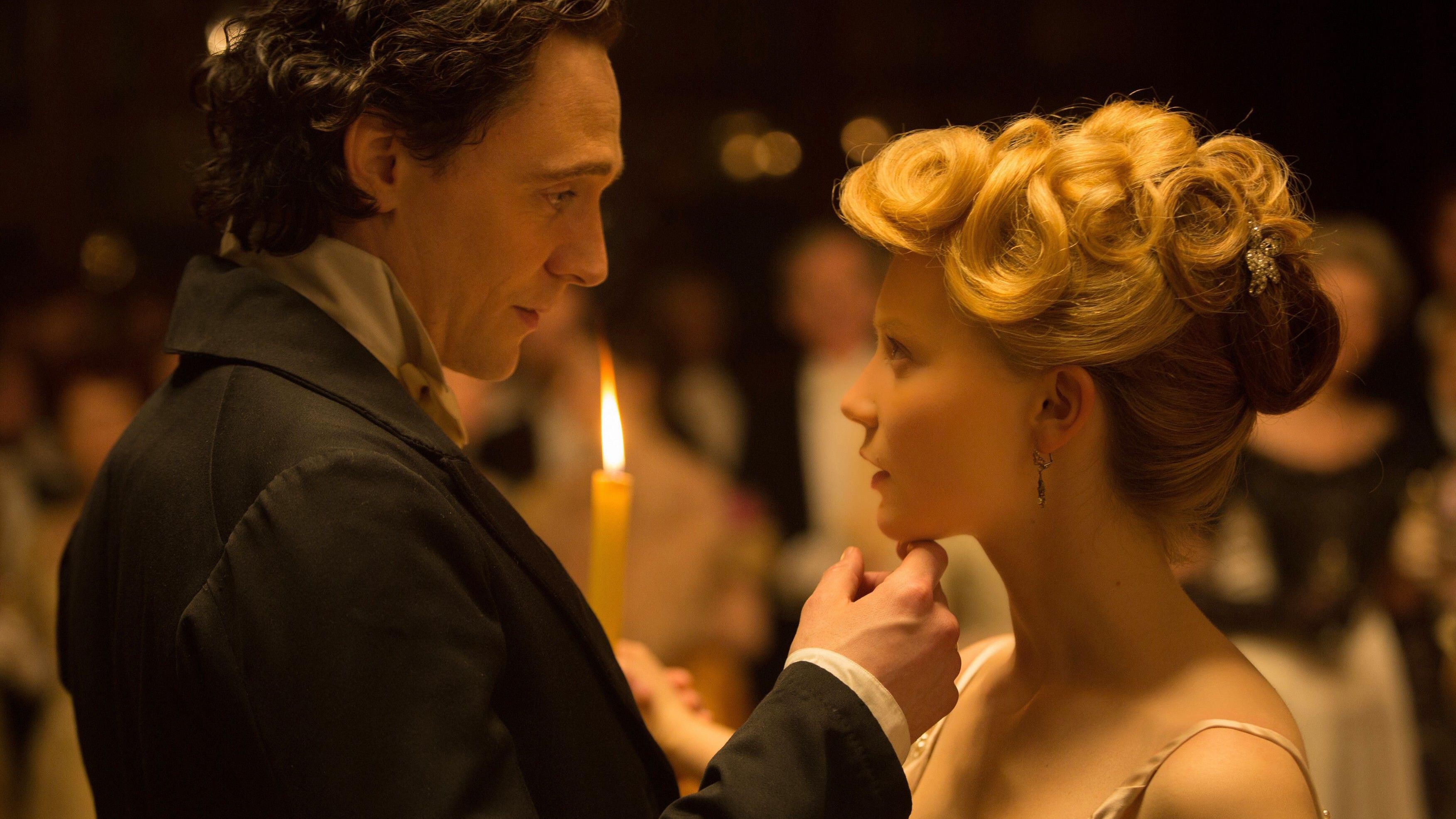 L-R: Tom Hiddleston and Mia Wasikowska dance together in a scene from &quot;Crimson Peak&quot;