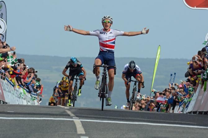 Simon Yates (Great Britain) celebrates victory in stage 6 at the Tour of Britain on the Haytor mountain finish