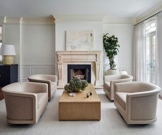 Cream and gray formal living room with seating