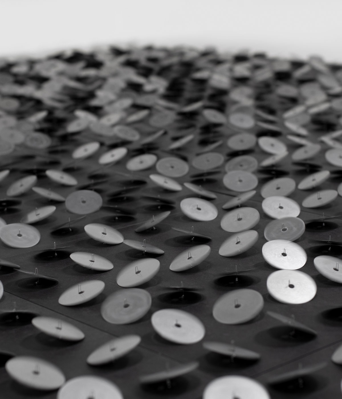 Black metal discs are set in motion