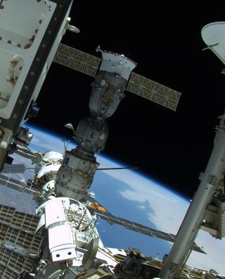 In this spacewalk photo by Endeavour shuttle astronaut Mike Fincke, Russia's Soyuz capsule