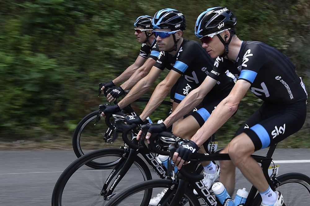 Chris Froome rolls along in the peloton during stage 4.