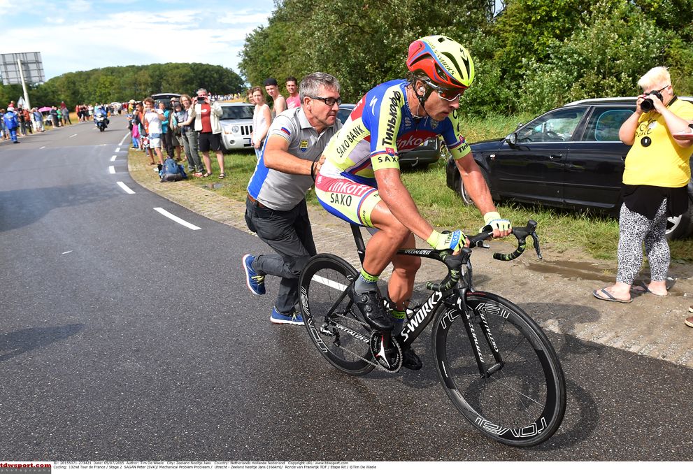 Peter Sagan (Tinkoff - Saxo) takes a push after a mechanical