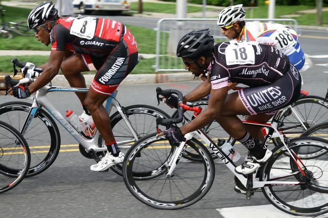 Sprinter Adam Alexander (CRCA/Foundation) is nicely tucked into the pack as Jermaine Burrowes (W.S.United/Mangoseed) rides shotgun.