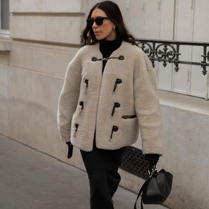 Jessica Skye wearing Toteme shearling jacket