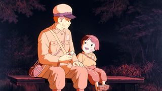 Seita and Setsuko sitting on a bench in 