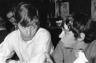 Burdon and Georgie Fame enjoy a drink at the Pickwick club in 1966