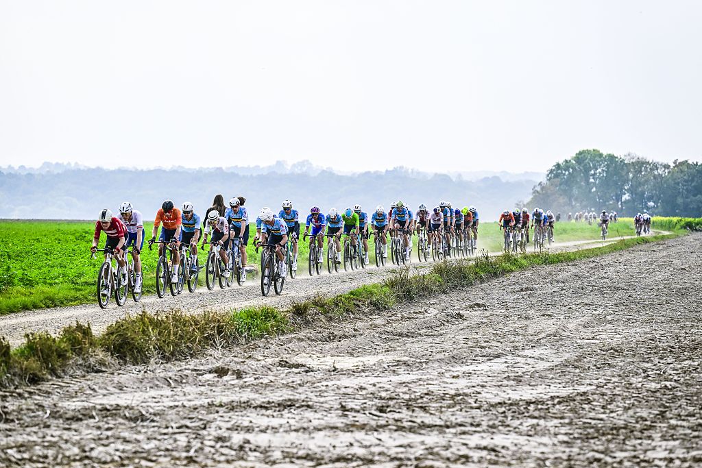 The pack of riders pictured in action during the men elite race at the UCI World Gravel Championships, Sunday 12 October 2025, in Maastricht, The Netherlands. BELGA PHOTO DIRK WAEM (Photo by DIRK WAEM / BELGA MAG / Belga via AFP)