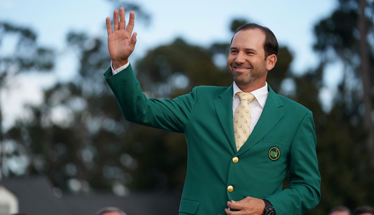 Sergio Garcia waves whilst wearing the Green Jacket