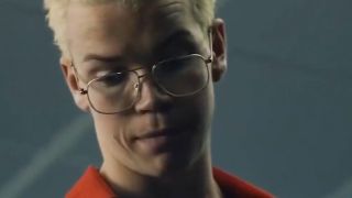 Will Poulter wearing glasses, looking disappointed.