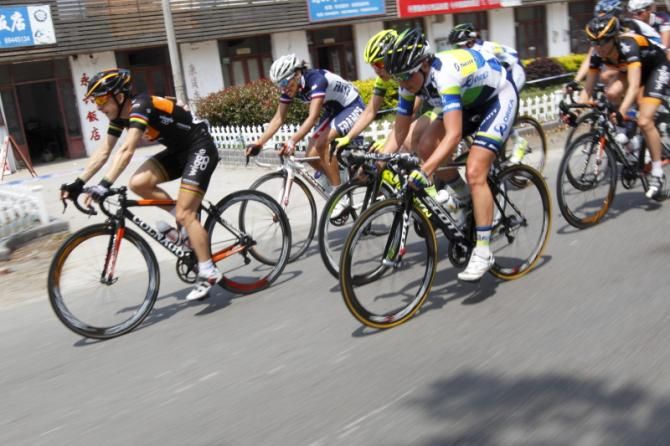 Giorgia Bronzini (Wiggle Honda) and Loes Gunnewijk (Orica - AIS) lead through a small town