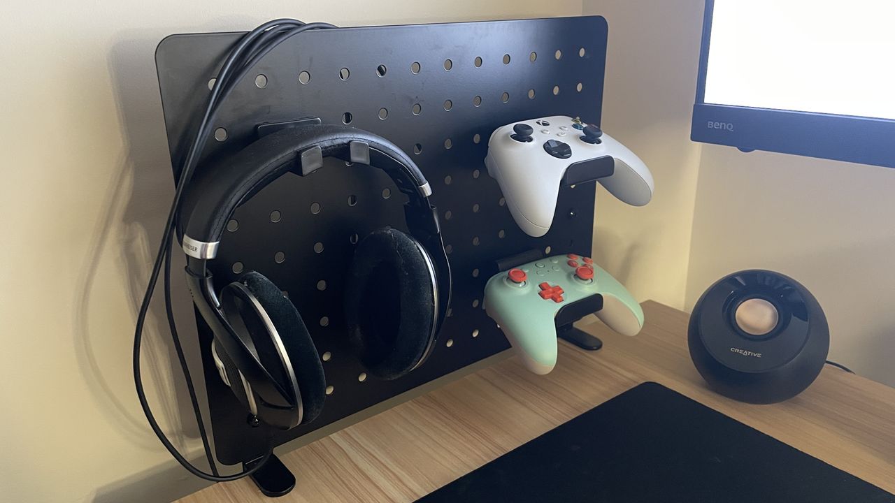 Thermaltake Gaming Desk Pegboard (Medium) with 2x controller and 1x headset accessories