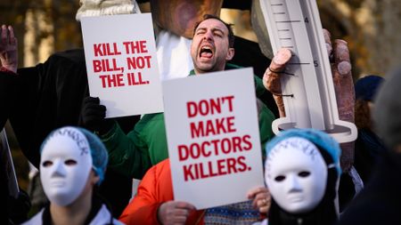 Anti-euthanasia protesters outside of the Houses of Parliament in London to oppose the End of Life bill.