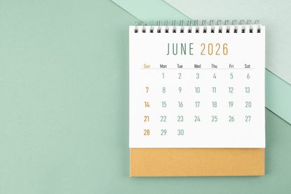 June 2026 calendar on a green background