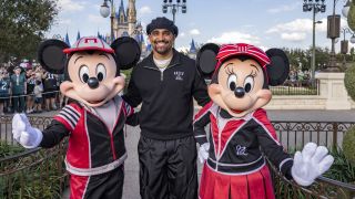 Super Bowl MVP quarterback Jalen Hurts poses with Mickey Mouse and Minnie Mouse during a celebratory visit to Walt Disney World Resort in Lake Buena Vista, Fla. on Monday, Feb. 10, 2025. A day after leading the Philadelphia Eagles to a Super Bowl win, Hurts was the star of a championship parade at Magic Kingdom Park featuring Disney characters, festive music and thousands of cheering fans.