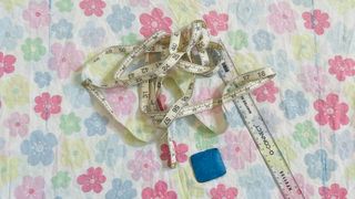 How to make a tote bag; close up of fabric and measure 