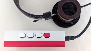 Top panel of the Fiio CP13 with headphones