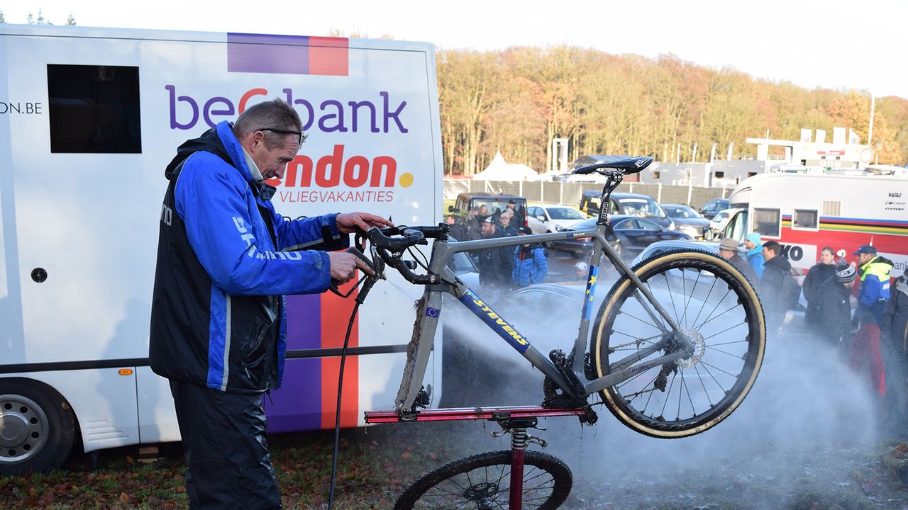 Former cyclocross world champion, Tour de France stages, Flanders and Liege-Bastogne-Liege winner, and van der Poel's father Adri cleans his son's bike after warming up