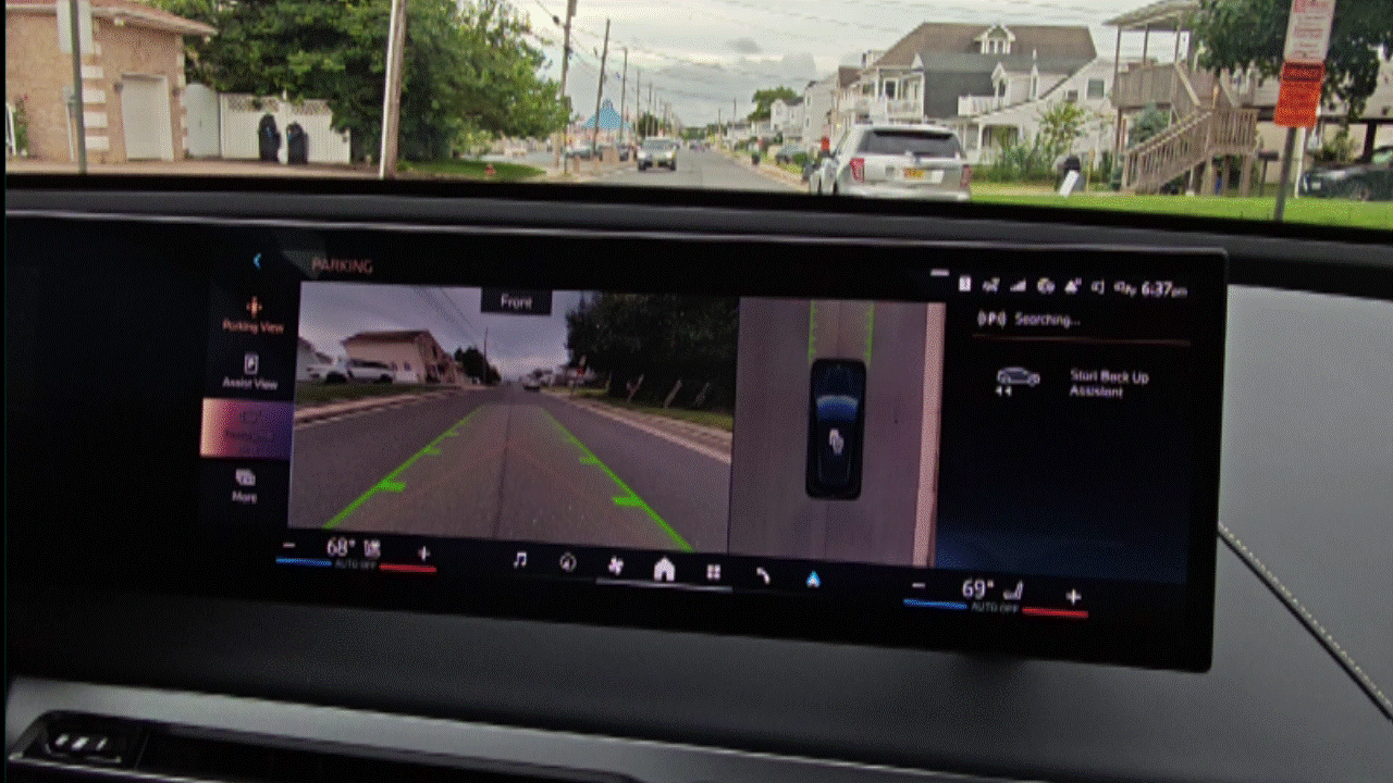 Gif animation of 2026 BMW ix xDrive45 camera.