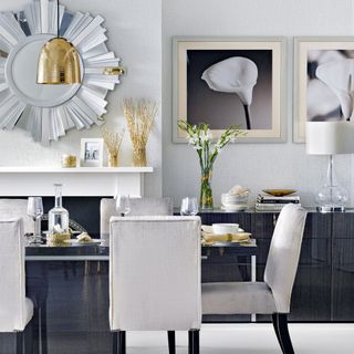 Grey dining room with monochrome and metallic accents