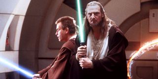 Star Wars: The Phantom Menace Obi Wan and Qui-Gon with lightsabers at the ready