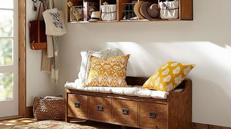 Entryway with wooden bench and wooden shelves