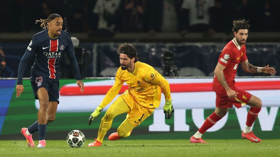 Bradley Barcola of Paris Saint-Germain takes on goalkeeper Alisson Becker of Liverpool during a UEFA Champions League 2024/25 match