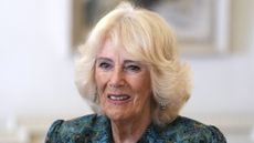 Queen Camilla hosts a tea party and treasure hunt for children supported by Dreams and Wishes