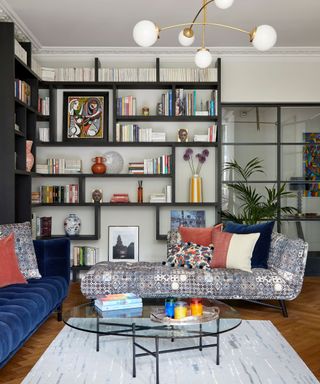 Modern living room with floor to ceiling shelving