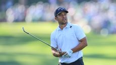 Xander Schauffele with a wedge in hand at the 2024 Masters