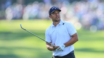 Xander Schauffele with a wedge in hand at the 2024 Masters