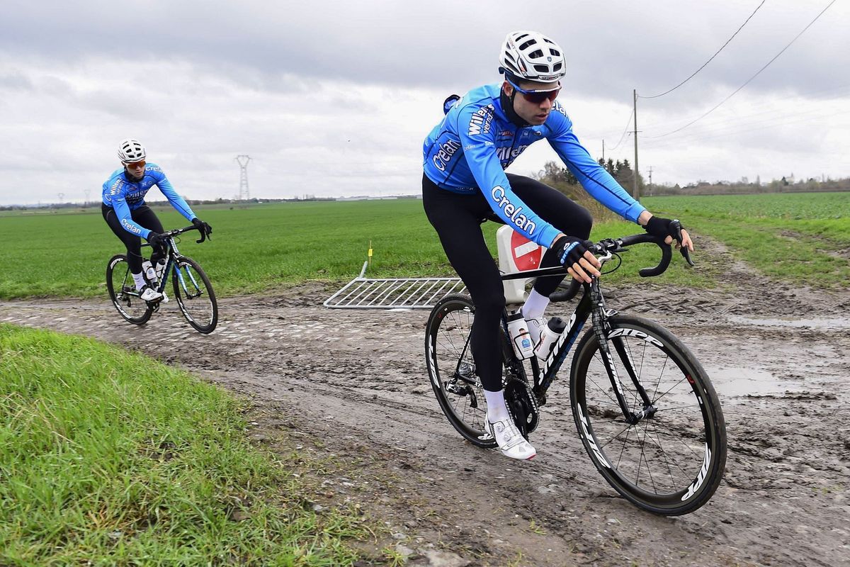 Wout Van Aert (Verandas Willems Crelan) tests the muddy pav&eacute; of Paris-Roubaix