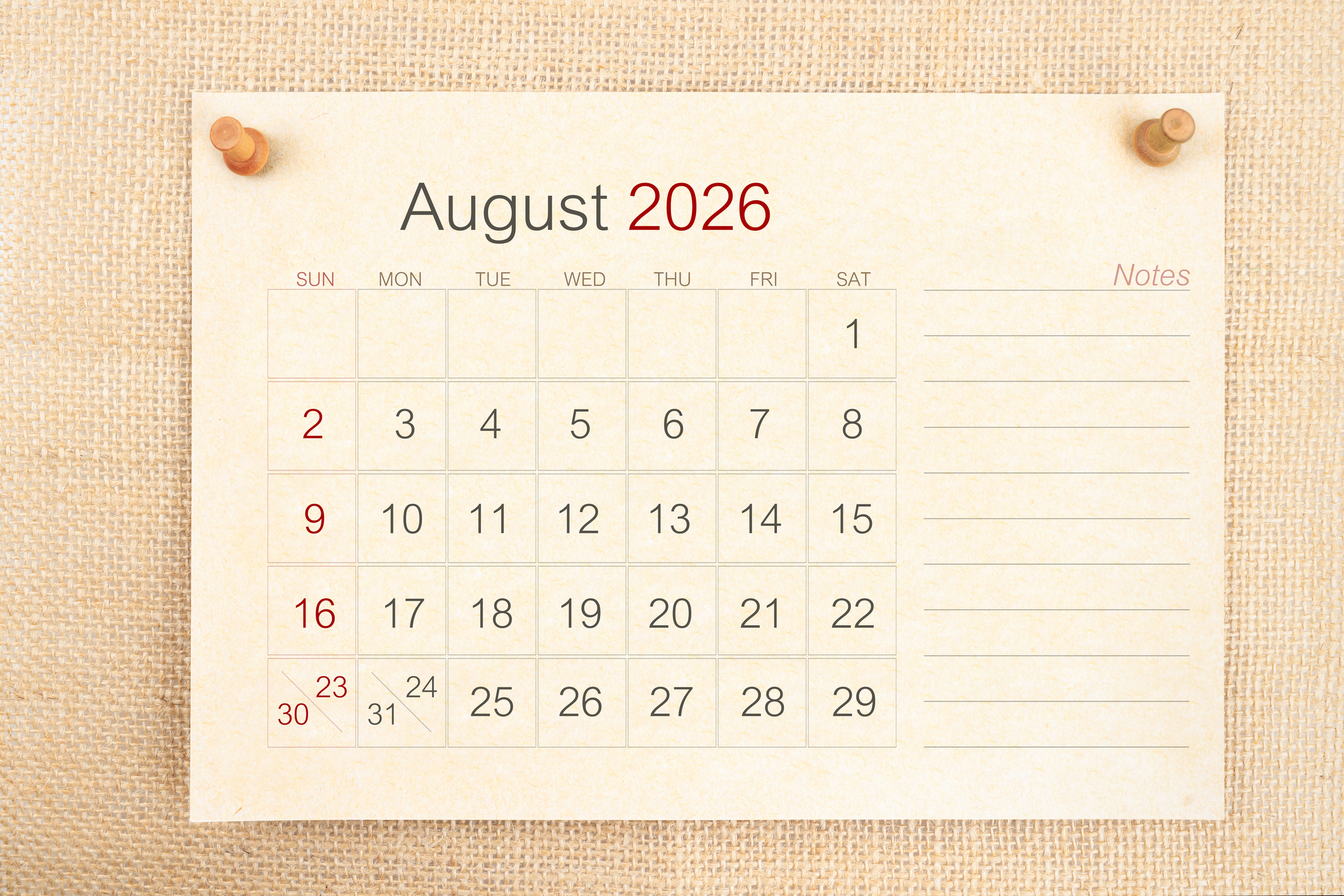 Desk Calendar 2026: August card calendar is used to plan daily work and life with a push pin on burlap background.