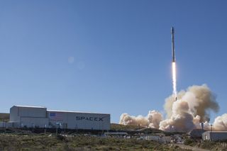 A SpaceX Falcon 9 rocket launches the first 10 Iridium NEXT communications satellites into orbit from Vandenberg Air Force Base in California on Jan. 14, 2017. SpaceX will use the same Falcon 9 rocket booster to launch another satellite from NASA's Kenned