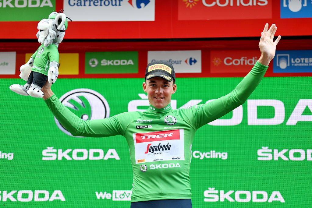 ALICANTE SPAIN AUGUST 30 Mads Pedersen of Denmark and Team Trek Segafredo celebrates winning the Green Points Jersey on the podium ceremony after the 77th Tour of Spain 2022 Stage 10 a 309km individual time trial stage from Elche to Alicante LaVuelta22 WorldTour on August 30 2022 in Alicante Spain Photo by Justin SetterfieldGetty Images