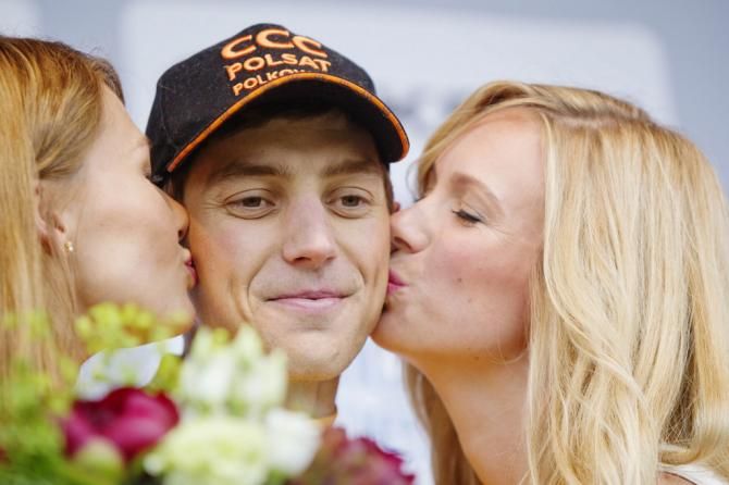 Maciej Paterski (CCC Polsat) receives kisses on the podium