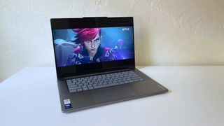 The Lenovo Yoga Slim 7i Aura edition showing a scene from season 2 of Netflix's Arcane