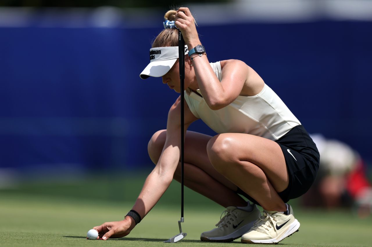 Nelly Korda lines up a putt on the 14th green during the first round of The Chevron Championship