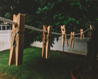 clothes pegs on an outdoor clothesline