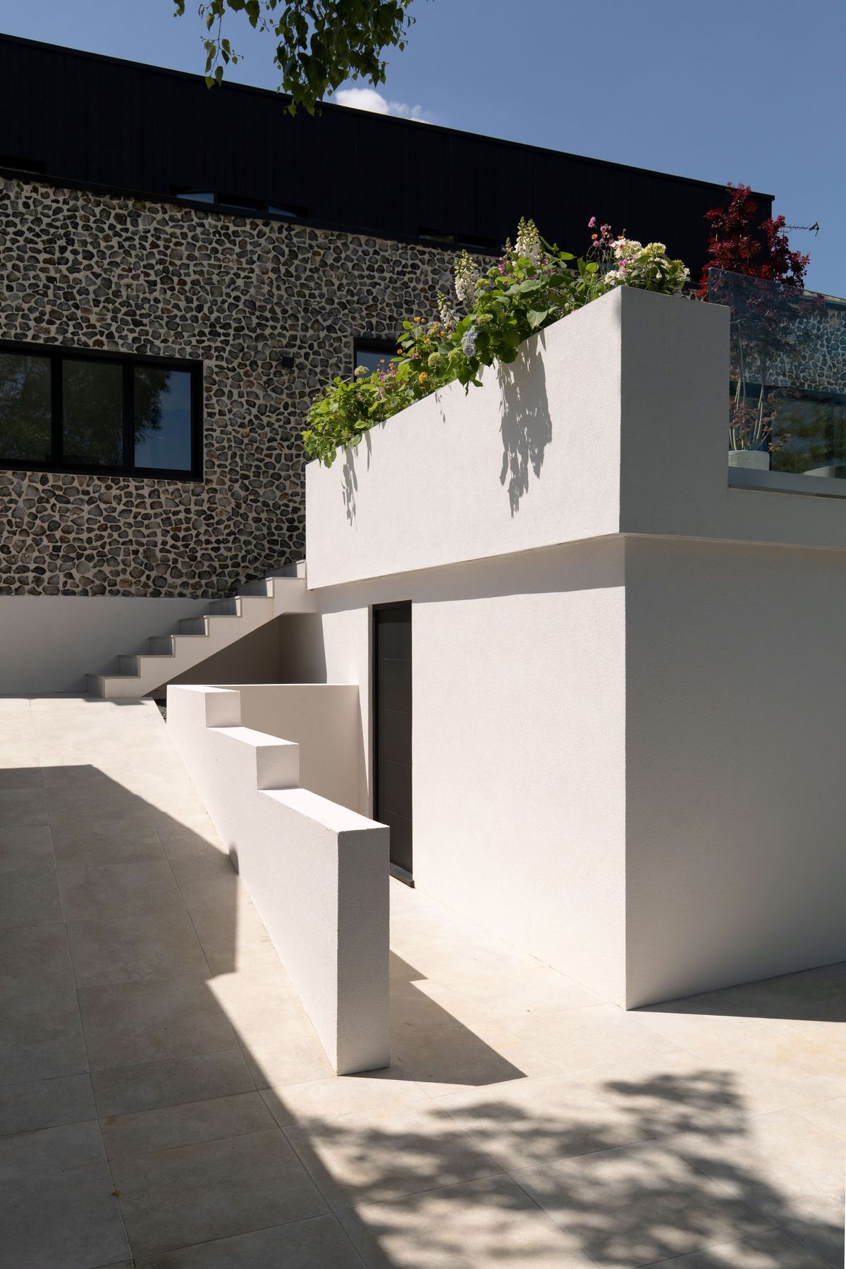 A closer shot of the stairs leading down to the garden of the home