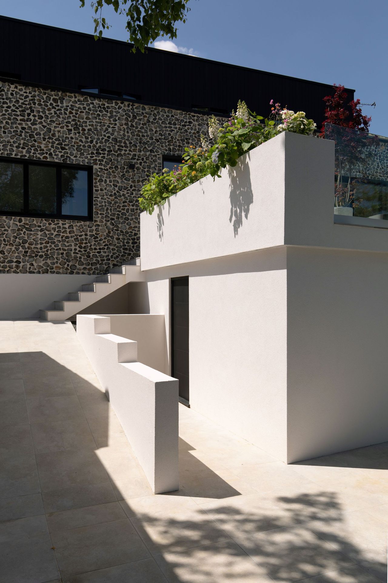 A closer shot of the stairs leading down to the garden of the home