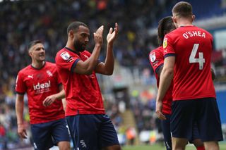 Matt Phillips of West Bromwich Albion celebrates after scoring a goal to make it 0-1 with Dara O'Shea of West Bromwich Albionduring the Sky Bet Championship between Reading and West Bromwich Albion at Select Car Leasing Stadium on October 15, 2022 in Reading, United Kingdom.