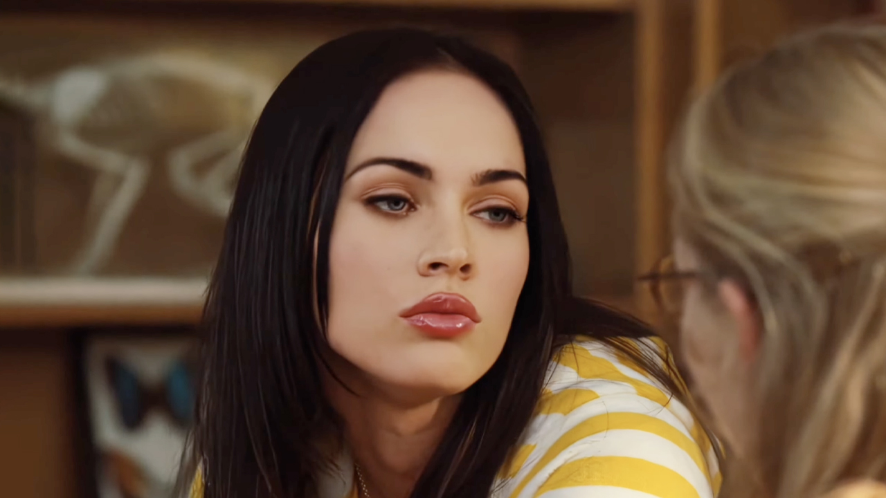Megan Fox in a yellow and white striped shirt in Jennifer's body.