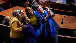 Democratic Representatives ahead of President Joe Biden's State of the Union Address wear a mix of yellow and bright blue.