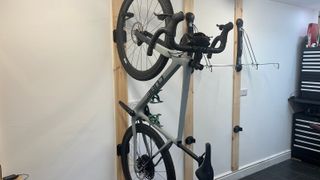 Bike fixed to wall with Lezyne CNC Alloy Wheel Hook