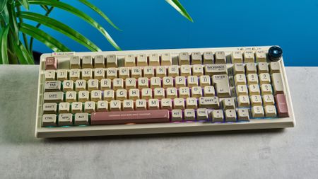 A beige, brown and off-white Epomaker RT100 wireless mechanical keyboard