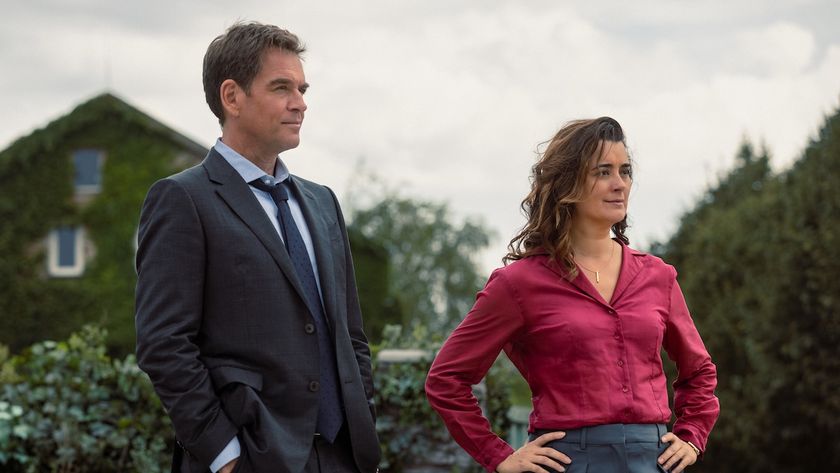 Michael Weatherly and Cote de Pablo standing outdoors near house in NCIS: Tony and Ziva